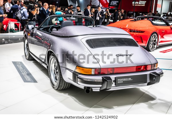 Paris, France, October\
02, 2018: metallic silver Porsche 911 Carrera 3.2 Speedster at\
Mondial Paris Motor Show, sports car manufactured by German car\
manufacturer Porsche