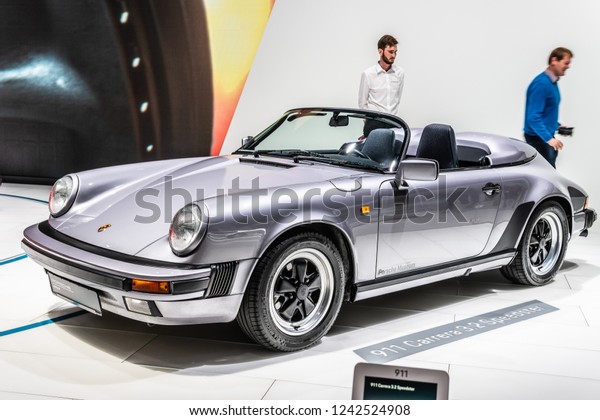 Paris, France, October\
02, 2018: metallic silver Porsche 911 Carrera 3.2 Speedster at\
Mondial Paris Motor Show, sports car manufactured by German car\
manufacturer Porsche
