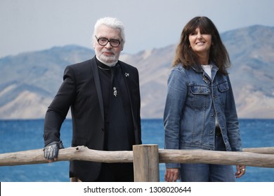 PARIS, FRANCE - OCTOBER 02: Karl Lagerfeld and Virginie Viard walks the runway after the Chanel show as part of the Paris Fashion Week Womenswear Spring/Summer 2019 on October 2, 2018 in Paris, France