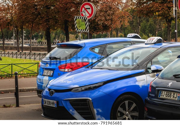 PARIS, FRANCE - October 07, 2017 : Parisian Taxi\
Hype from the company Taxi Electrique Parisien, the first fleet of\
hydrogen taxis launched in the world on the occasion of the COP 21\
December 7, 2015