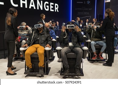 PARIS, FRANCE - OCTOBER 11, 2016: Man Tries Virtual Reality Samsung Gear VR Headset During Paris Motor Show. 