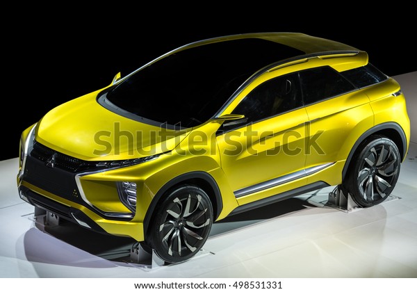 PARIS, FRANCE - October 12, 2016 : The electric SUV\
concept car EX Concept from Mitsubishi car manufacturer at the\
Paris Motor show 2016.