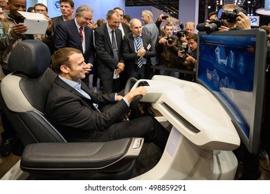 PARIS, FRANCE - OCTOBER 15, 2016 : Emmanuel Macron On The Stand Faurecia At The Paris Motor Show 2016.