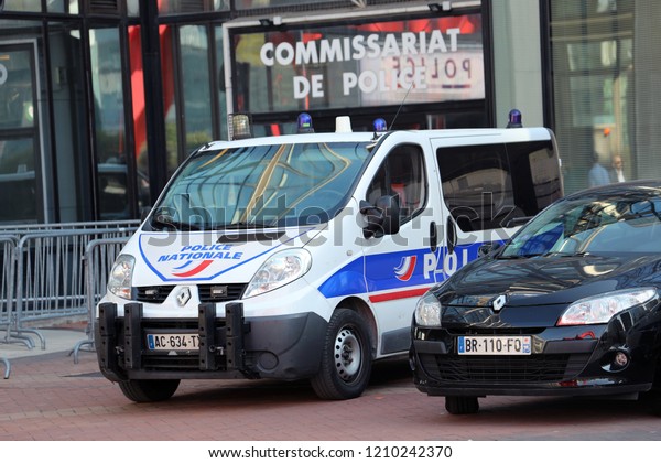 Paris, France - October 16, 2018: French Police Van\
Renault Trafic Parked In Front Of The Police Station. La DÃ©fense\
District, Europe 