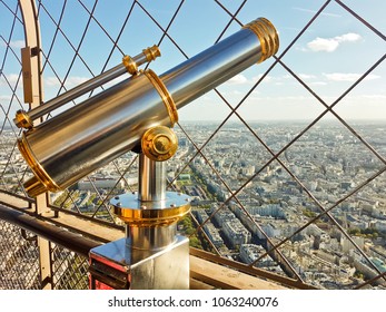 PARIS, FRANCE - OCTOBER 20, 2017: Atop The Most Famous Icon In Paris,the Eiffel Tower, One Can View The Beautiful City Streets And Architecture Below From This Shiny Gold And Silver Viewfinder.