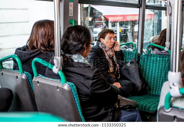 PARIS, FRANCE - OCTOBER, 2016:\
Passengers inside public bus in Paris, transportation in\
France