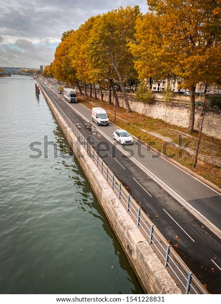 Paris, France - October 2019 : Quays of the\
Seine river in Autumn, Paris in the\
Fall
