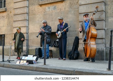 Paris / France - October 21 2018: Cute Old Lady Dancing In The Parisian District Of Marais With Street Musicians Dixieland Jazz Band