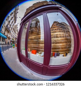 PARIS, FRANCE, On OCTOBER 29, 2018. The Urban View In The Cloudy Autumn Morning, The Street Is Reflected In A Show-window Of Shop. Fisheye View