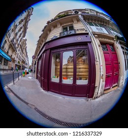 PARIS, FRANCE, On OCTOBER 29, 2018. The Urban View In The Cloudy Autumn Morning, The Street Is Reflected In A Show-window Of Shop. Fisheye View