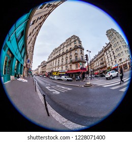 PARIS, FRANCE, On OCTOBER 29, 2018. The Typical City Street With Historical Building, Pedestrians Go On The Sidewalk, Fisheye View