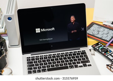 PARIS, FRANCE - SEP 10, 2015: Apple Computers Website On MacBook Pro Retina In A Creative Room Environment Showcasing Apple Top Management And Microsoft Logo