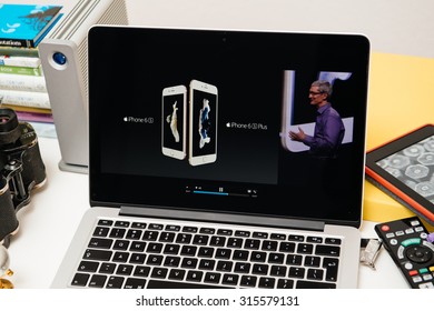 PARIS, FRANCE - SEP 10, 2015: Apple Computers Website On MacBook Pro Retina In A Creative Room Environment Showcasing Tim Cook Comparing IPhone