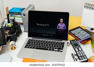 PARIS, FRANCE - SEP 10, 2015: Apple Computers Website On MacBook Pro Retina In A Creative Room Environment With Tim Cook And New Apple TV