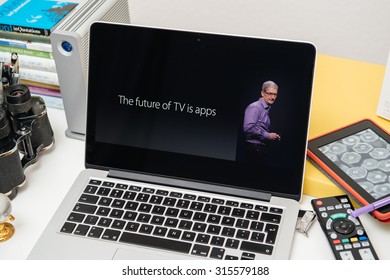 PARIS, FRANCE - SEP 10, 2015: Apple Computers Website On MacBook Pro Retina In A Creative Room Environment With Tim Cook And The Future Of TV Is Apps