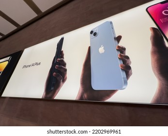 Paris, France - Sep 16, 2022: Large Advertising OOh Banner Board With Apple Computers IPhone 14 During The Launch Day Featuring New Dual Powerful Camera Car Crash Detection; And Satellite SOS