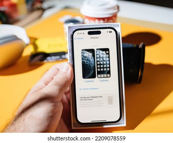 Paris, France - Sep 17, 2022: Setting Up New Smartphone - Add New Wallpaper In The IOS 16 Os On The New IPhone 14 Pro Max Smartphone By Apple Computers