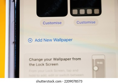 Paris, France - Sep 17, 2022: Add New Wallpaper In The IOS 16 Os On The New IPhone 14 Pro Max Smartphone By Apple Computers