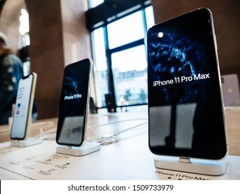 Paris, France - Sep 20, 2019: Low Wide-angle Of The New IPhone 11, 11 Pro And Pro Max Are Displayed As The Smartphone By Apple Computers Goes On Sale - Demo Wallpaper