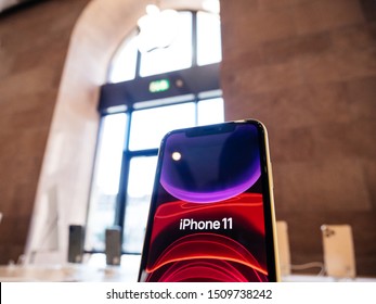 Paris, France - Sep 20, 2019: The New IPhone 11 Red Wallpaper Displayed In Apple Store As The Smartphone By Apple Computers Goes On Sale