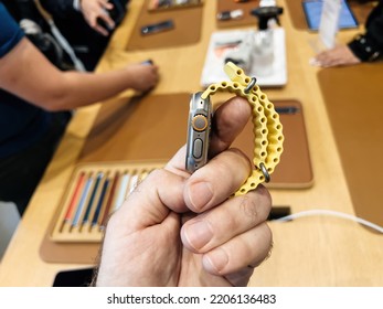 Paris, France - Sep 23, 2022: Apple Store First Day Of Sale For New Titanium Apple Watch Ultra Designed For Extreme Activities - Man Holding The New Ocean Band