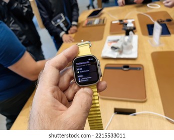 Paris, France - Sep 23, 2022: Customer In Apple Store First Day Of Sale For New Titanium Apple Watch Ultra Medicine Treatments App Testing - Healthcare Reminder