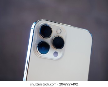 Paris, France - Sep 24, 2021: Rear view of triple improved camera array on iPhone 13 Pro at the Apple Store as latest new 5G iPhone iPad and iPad mini go on sale - new camera new bionic CPU
