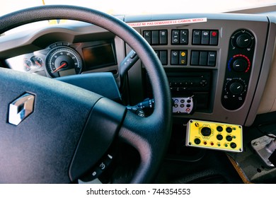 PARIS, FRANCE -SEPT 5, 2014: Interior Of Modern Renault Industrial Sewer Cleaning Truck With Vacuum And Hydro Excavation - Buttons, Steering Wheel, Dashboard Command