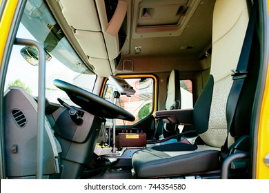 PARIS, FRANCE -SEPT 5, 2014: Interior Of Modern Renault Industrial Sewer Cleaning Truck With Vacuum And Hydro Excavation - Buttons, Steering Wheel, Dashboard Command