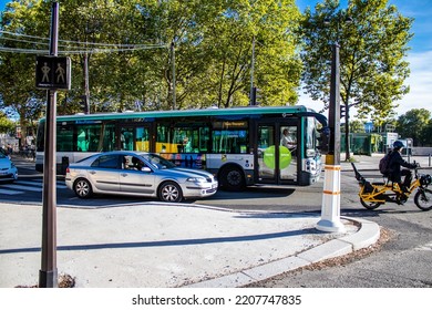 Paris, France - September 14, 2022 Bus Driving Through The Streets Of Paris, Buses Are Inexpensive And Drop You Off At Any Location In The Capital Quite Quickly, Many Of Its Buses Run On Gas