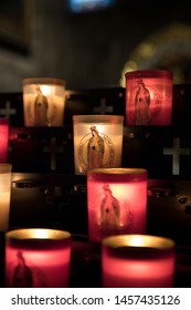PARIS, FRANCE, SEPTEMBER 2018. 
Candles with the image of our Lady of Guadalupe lit in the cathedral of Notre Dame.