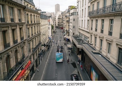 Paris, France - September 23 2019: A Rue De Mogador Street With Few People Walking And No Vehicles Except For One Double Decker Tour Bus. 