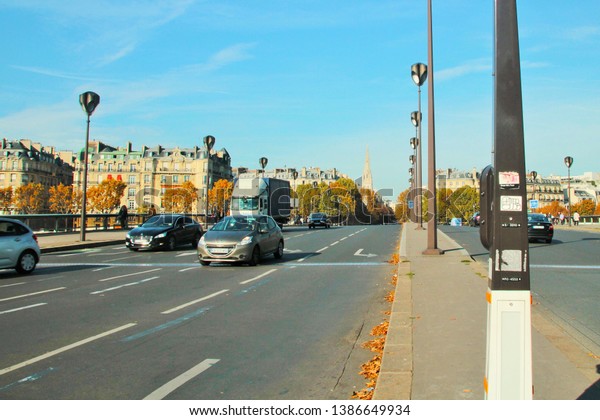 Paris, France,10/27/2015 Illustrative\
Editorial  Bridge over the river Seine, car\
traffic.