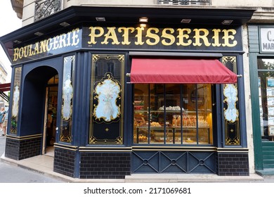 Paris, France-June 16 , 2022 : The Vintage Bakery And Cake Shop Au Pain Retrouve Located In 6th District Of Paris. The Front Shows The Ornaments Of Woodwork , Set Under Glass, With Gold Leaf.