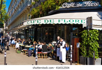 Paris, France-May 05, 2016: The Famous Cafe De Flore Located At The Corner Of Boulevard Saint Germain And Rue Saint Benoit. It Was Once Home To Intellectual Stars , From Hemingway To Pablo Picasso.