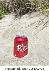 Paris, France-May 30, 2022: Can Of Dr Pepper Soft Drink In The Sand On The Beach. Dr Pepper Is A Non-alcoholic Drink With A Unique Taste. The Drink Was Created In The 1880s