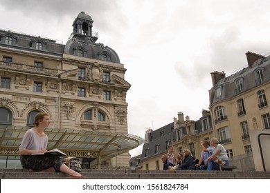 Paris, Ile De France / France - June 20, 2016: Tourist Draws In Her Sketchbook Outside Of The Musee D'Orsay