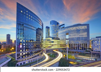  Paris. Image of office buildings in modern part of Paris during sunset.