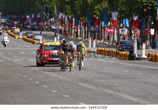 PARIS, JUL 24: The peloton riding during\
the final stage of the \