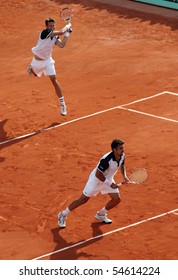 PARIS - JUNE 05: Daniel NESTOR (L) of Canada and Nenad ZIMONJIC (R) of Serbia during the men's doubles final match of the French Open at Roland Garros on June 05, 2010 in Paris, France.