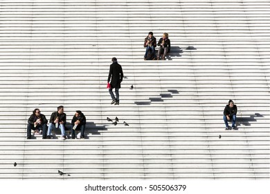 Paris, La Defense - January 16, 2015: Business People Lunching At The Stairs Of La Grande Arche At La Defense.