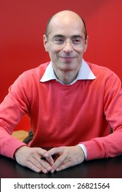 PARIS - MARCH 15: French Writer Bernard Werber During The Autograph Session At Paris Book Fair - Salon Du Livre 2009 On March 15, 2009 In Paris, France