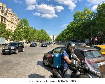 PARIS - MAY 8, 2018: Road Traffic On The Avenue De La Grande-Armée Towards The Arc De Triomphe In Paris, France.