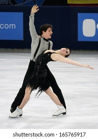 PARIS - NOVEMBER 15, 2013: Tessa VIRTUE / Scott MOIR Of Canada Perform Short Dance At Eric Bompard Trophy 2013 In Palais-Omnisports De Bercy, Paris, France.