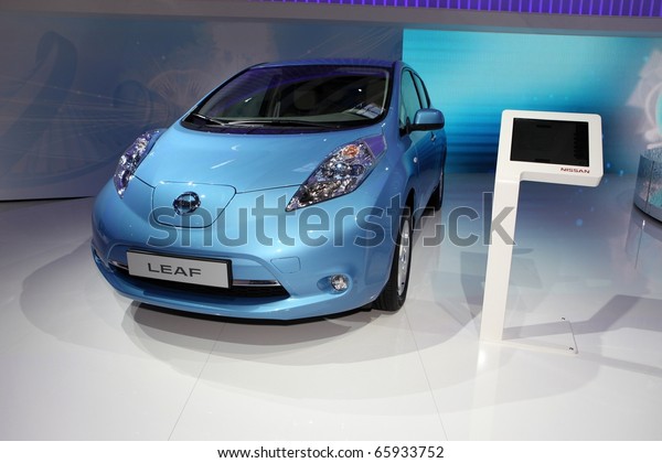 PARIS - OCTOBER 12: The\
new Nissan Leaf displayed at the 2010 Paris Motor Show on October\
12, 2010 in Paris