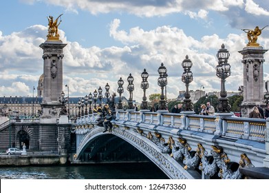 PARIS - OCTOBER 15: Pont Alexandre III (Alexandre III bridge) on October 15, 2012 in Paris.  The most ornate, extravagant bridge in Paris