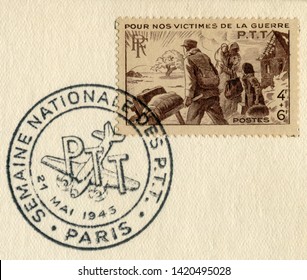 Paris, Republic Of France - 21 May 1945: French Historical Stamp: For Our War Victims. The Family Leaves Their Ruined Home, Special Postal Cancellation, Second World War
