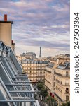 Paris roofs with Eiffel Tower in background, France