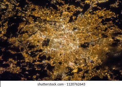 Paris seen from space. Night Paris a view from space, from above.  Paris from the sky. Elements of this image furnished by NASA. - Powered by Shutterstock