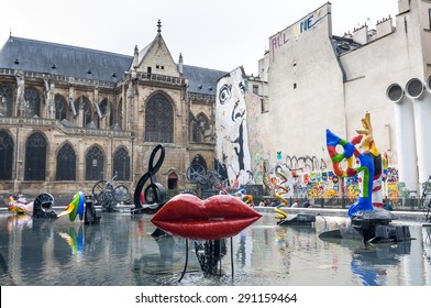 PARIS - SEPT 17, 2014: The Stravinsky Fountain is a whimsical public fountain ornamented with 16 works of sculpture, moving and spraying water, representing the works of Igor Stravinsky. Paris, France